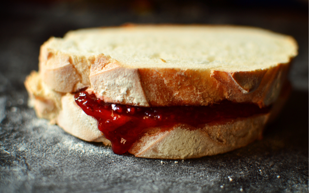 Picture of jam oozing out of a sandwich