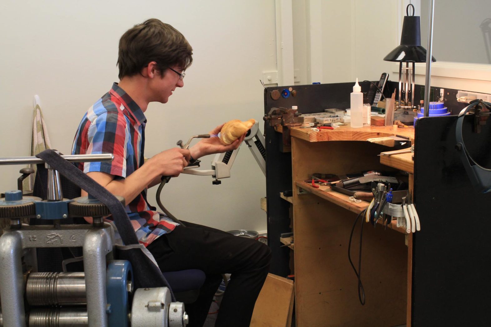 This is why I love the work space at Benjamin Black Goldsmiths' workshop - here's Ben casually toasting a croissant "the jeweller's way"...